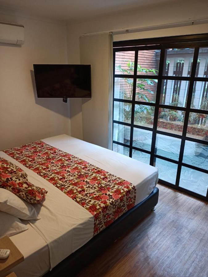 Hotel Poma Rosa Medellin Bagian luar foto